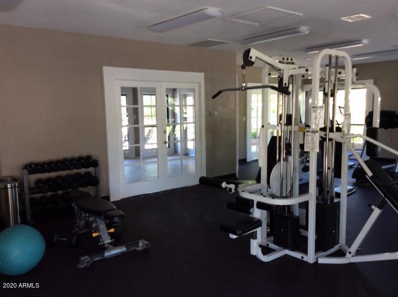8787 East Mountain View Road, Unit 1014 Scottsdale, AZ 85258 - Photo 20 of 27 a view of a room with gym equipment