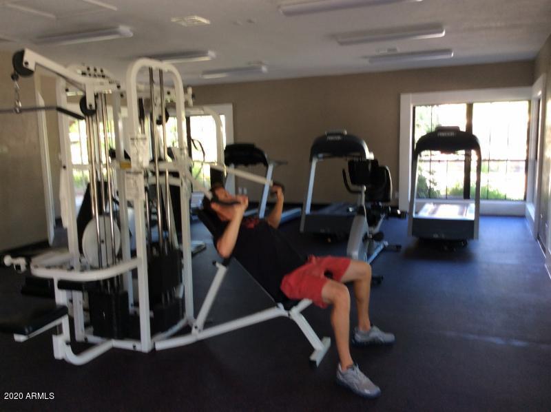 8787 East Mountain View Road, Unit 1014 Scottsdale, AZ 85258 - Photo 21 of 27 a view of a room with gym equipment