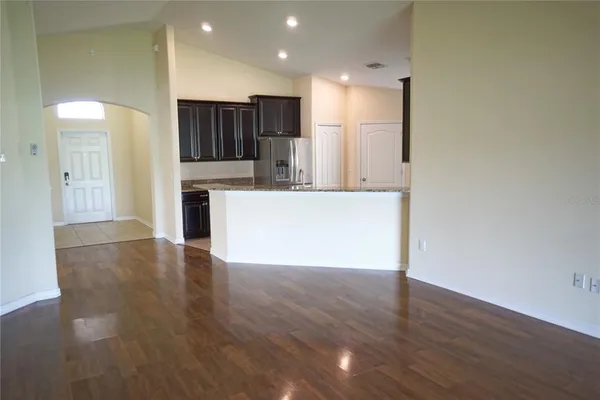 a view of kitchen with wooden floor