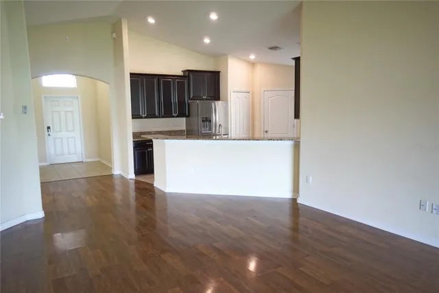 a view of kitchen with wooden floor