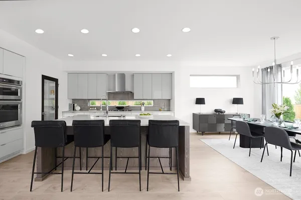 a view of living room with furniture and a flat screen tv