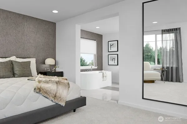 a bedroom with a bed and a television