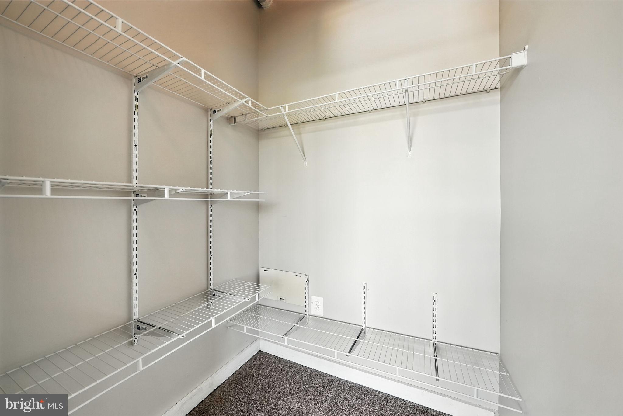 5885 Colorado Avenue Northwest, Unit 402 Washington, DC 20011 - Photo 12 of 30 a view of an empty walk in closet