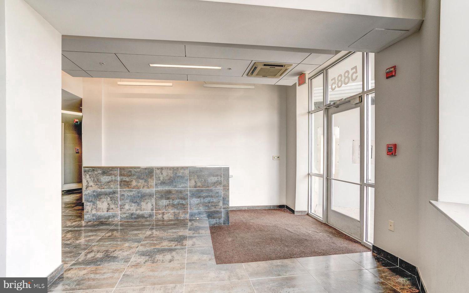 5885 Colorado Avenue Northwest, Unit 402 Washington, DC 20011 - Photo 23 of 30 a bathroom with a glass door shower