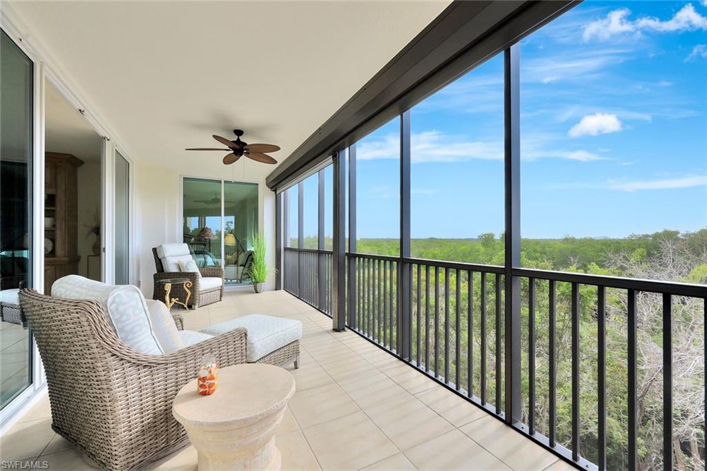 445 Cove Tower Drive, Unit 403 Naples, FL 34110 - Photo 18 of 42 a view of balcony with furniture