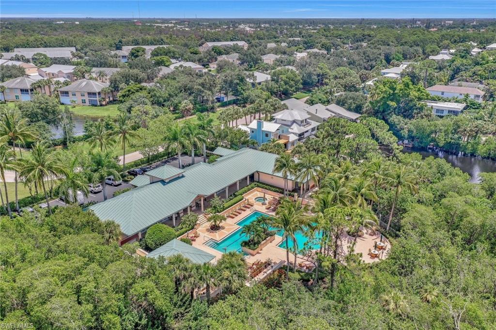 445 Cove Tower Drive, Unit 403 Naples, FL 34110 - Photo 31 of 42 an aerial view of multiple house