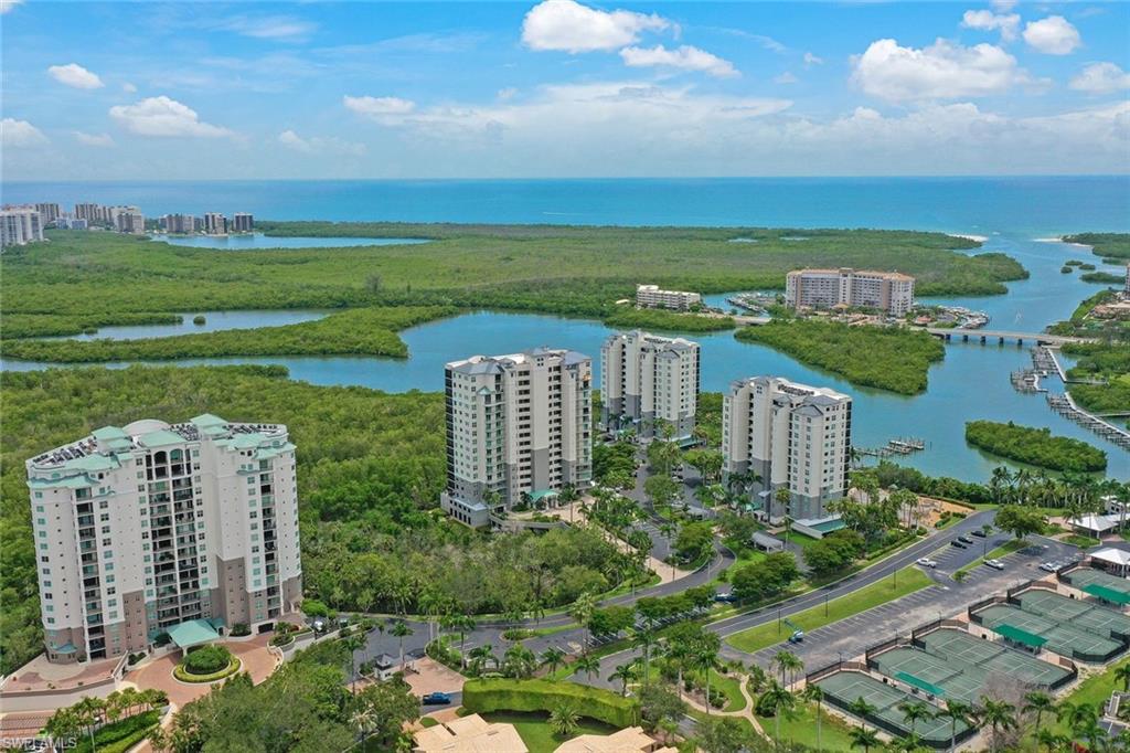 445 Cove Tower Drive, Unit 403 Naples, FL 34110 - Photo 35 of 42 a view of a city with tall buildings