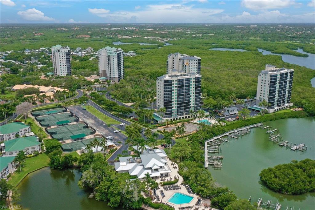 445 Cove Tower Drive, Unit 403 Naples, FL 34110 - Photo 37 of 42 a view of a city with tall buildings