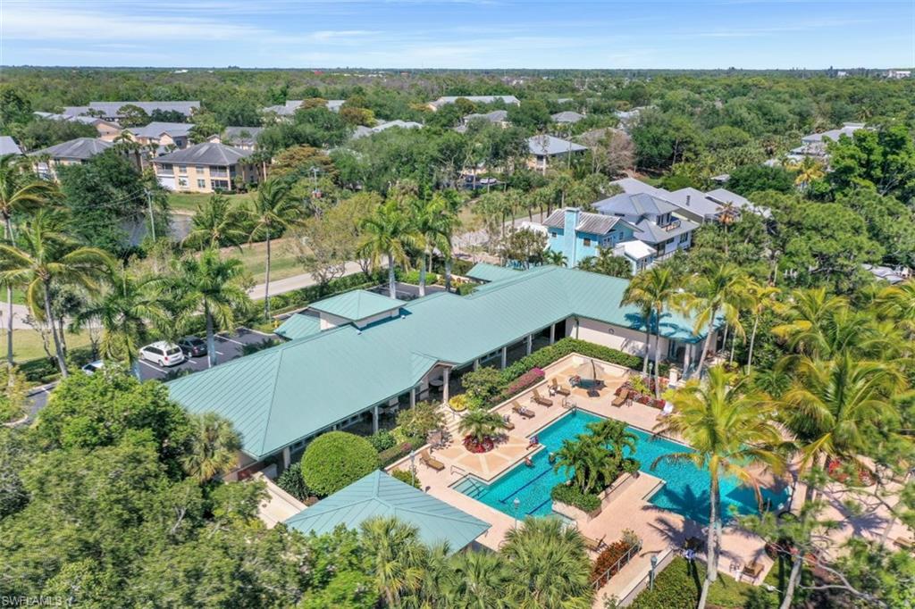 445 Cove Tower Drive, Unit 403 Naples, FL 34110 - Photo 38 of 42 an aerial view of residential houses with outdoor space and street view