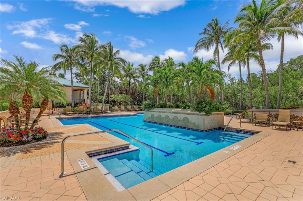 445 Cove Tower Drive, Unit 403 Naples, FL 34110 - Photo 40 of 42 a view of outdoor space patio and swimming pool