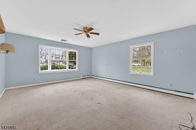78 Orton Road West Caldwell, NJ 07006 - Photo 24 of 50 a view of an empty room with a window