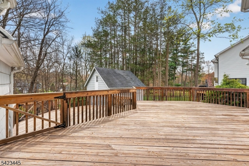 78 Orton Road West Caldwell, NJ 07006 - Photo 28 of 50 a view of balcony with wooden floor and fence