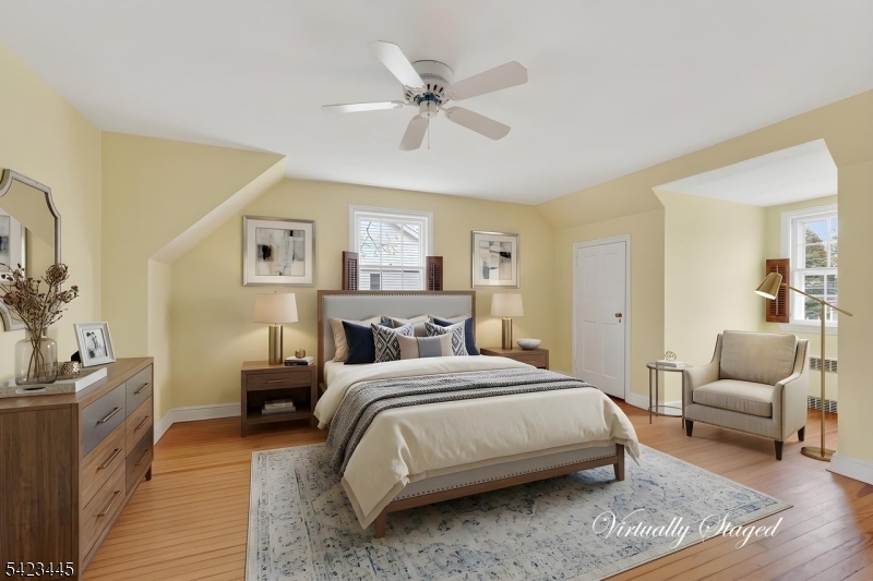 78 Orton Road West Caldwell, NJ 07006 - Photo 39 of 50 a bedroom with a bed couches and a couch