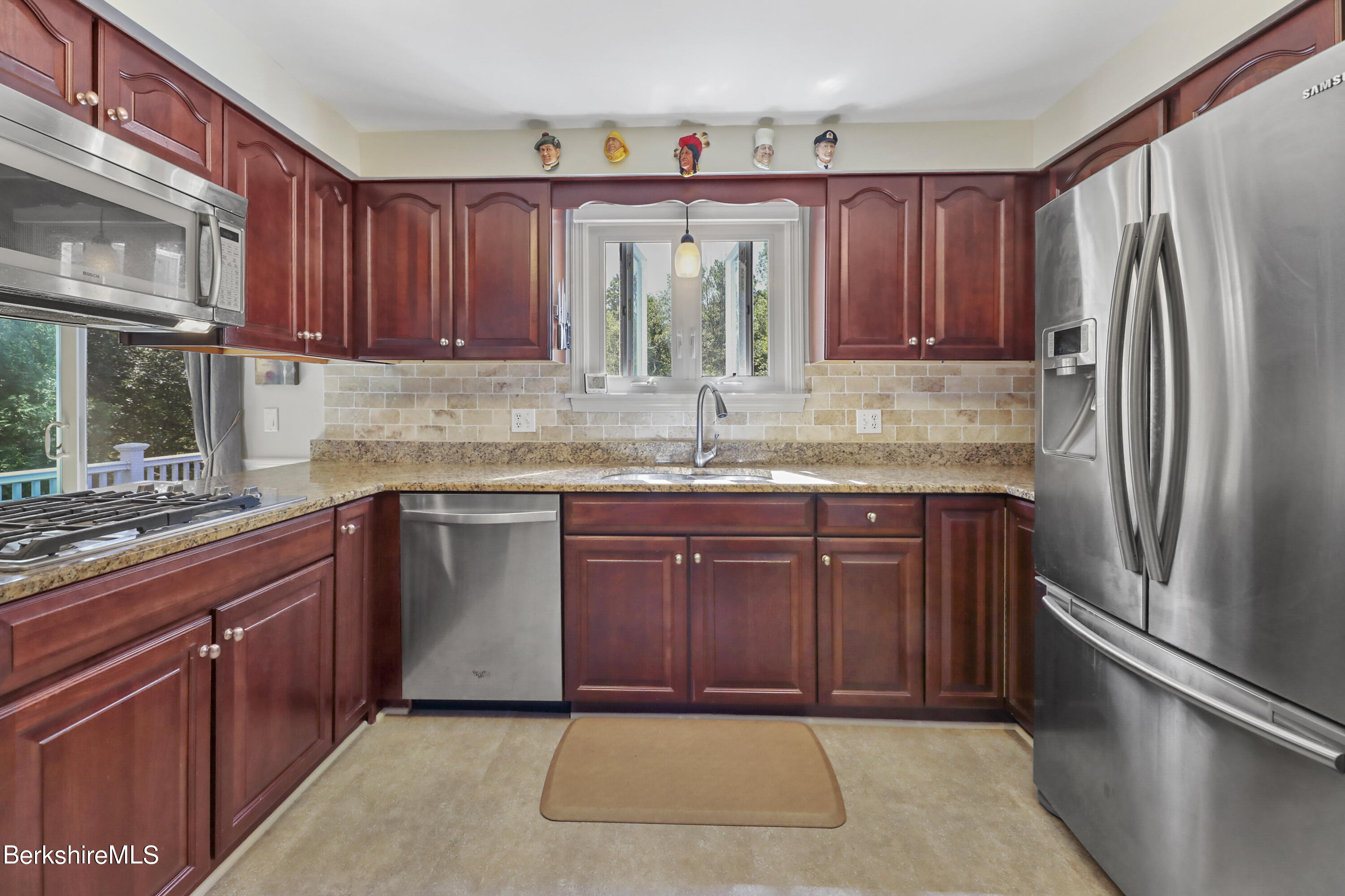 84 Brookside Drive Pittsfield, MA 01201 - Photo 13 of 54 a kitchen with stainless steel appliances granite countertop a refrigerator and a sink