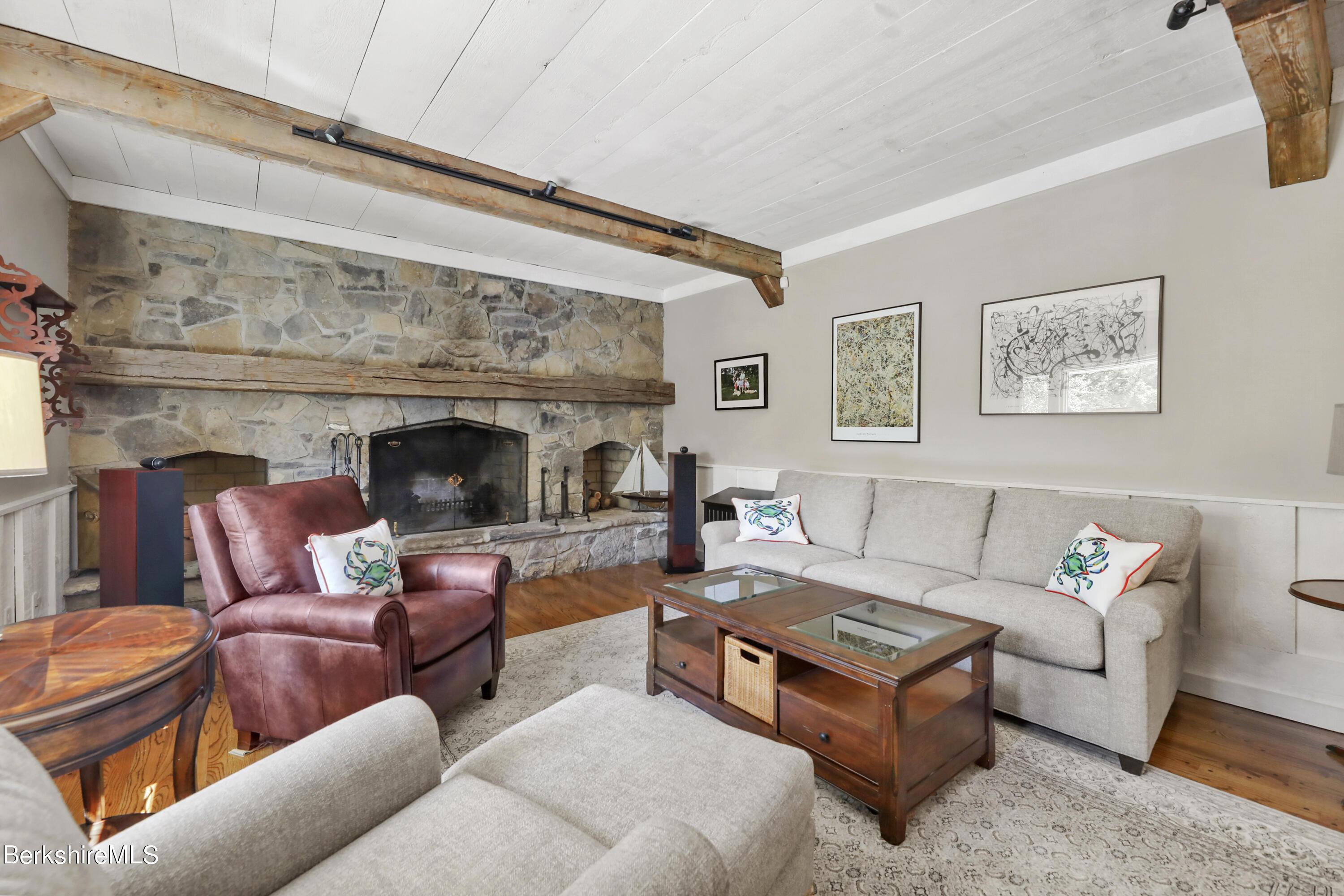 84 Brookside Drive Pittsfield, MA 01201 - Photo 16 of 54 a living room with furniture a fireplace and a large window