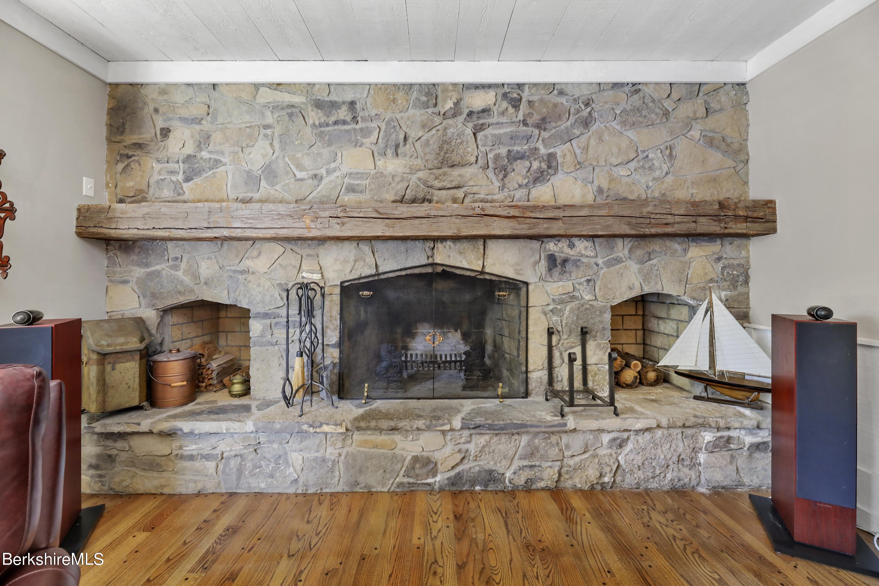 84 Brookside Drive Pittsfield, MA 01201 - Photo 17 of 54 a living room with fireplace and wooden floor