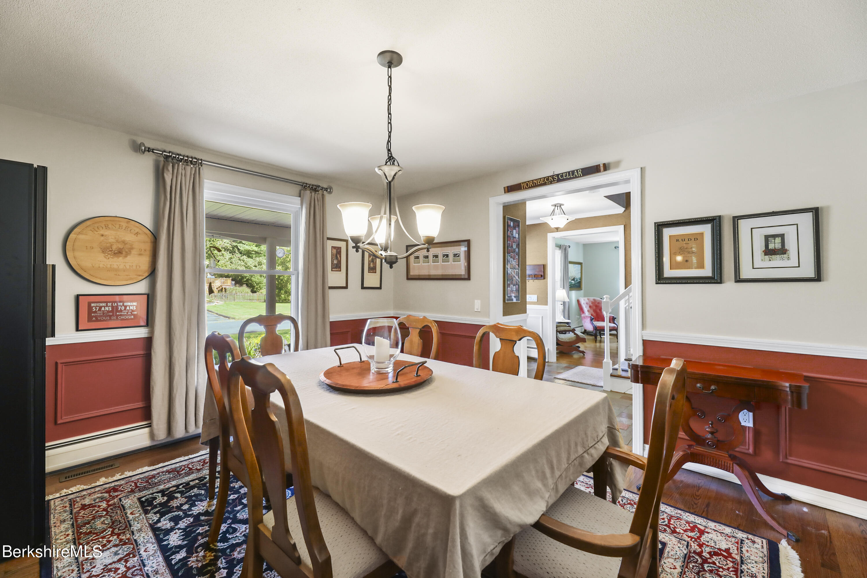 84 Brookside Drive Pittsfield, MA 01201 - Photo 20 of 54 a view of a dining room and livingroom with furniture window and wooden floor