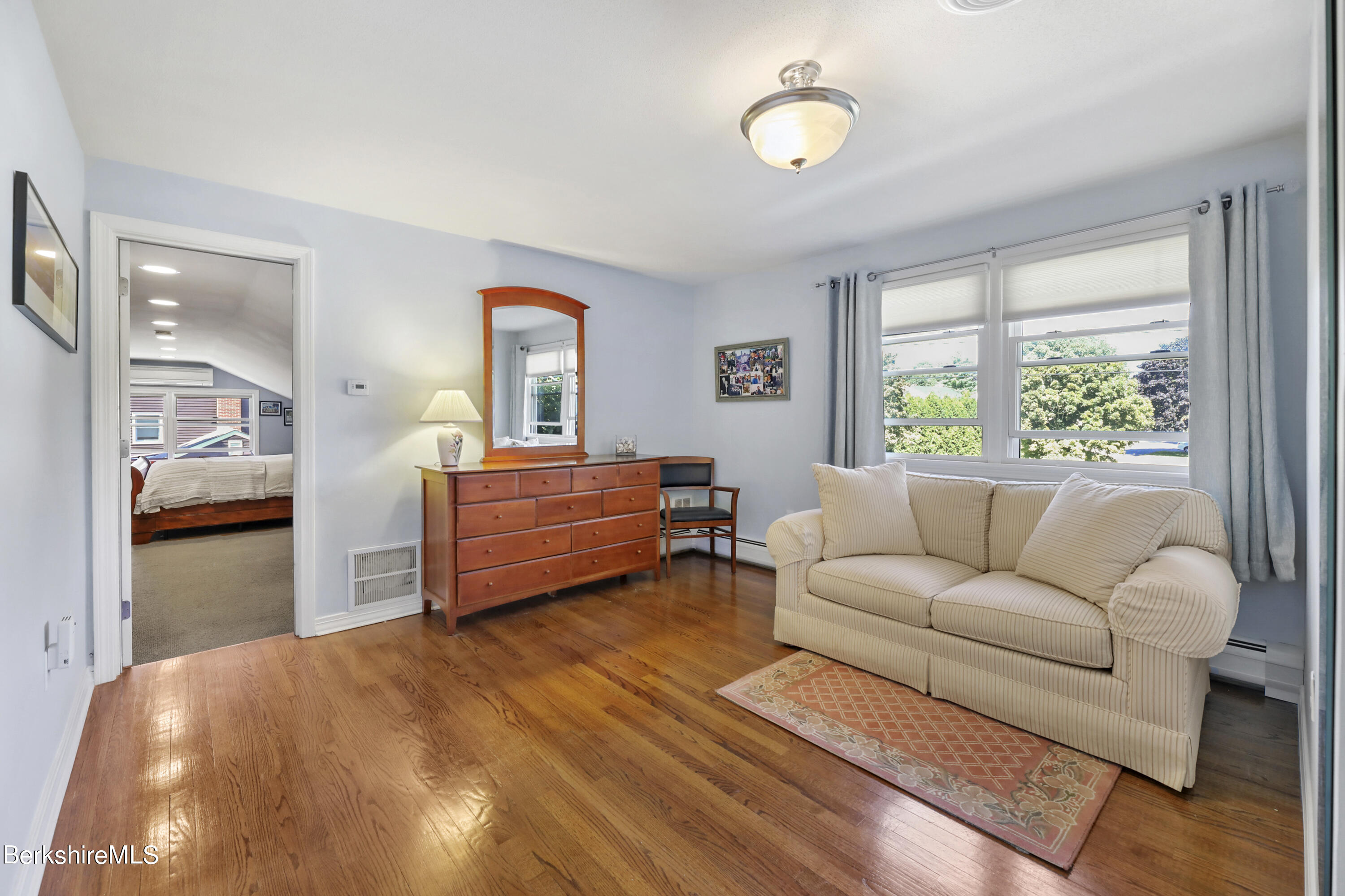 84 Brookside Drive Pittsfield, MA 01201 - Photo 25 of 54 a living room with furniture and a large window