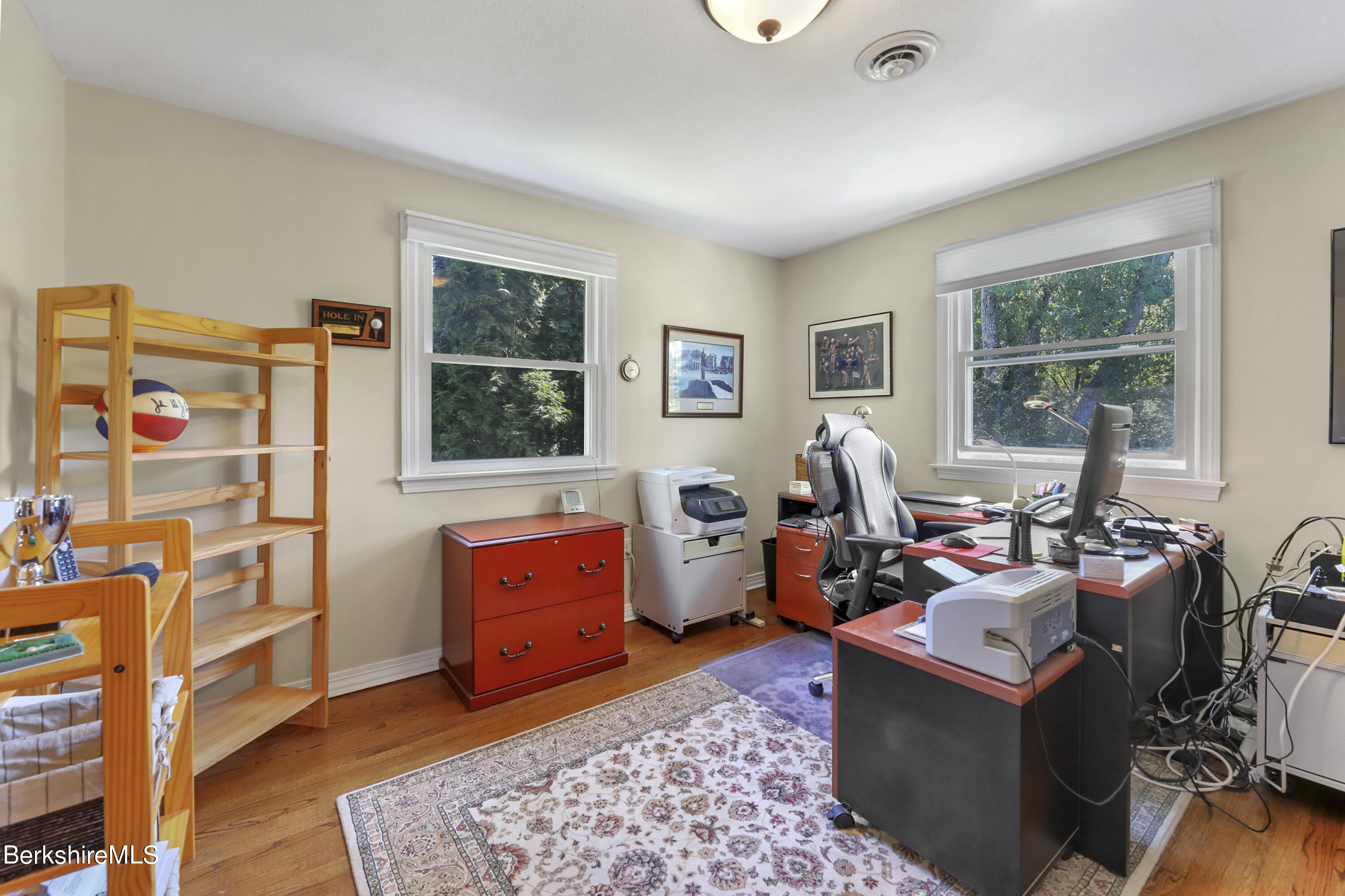 84 Brookside Drive Pittsfield, MA 01201 - Photo 32 of 54 a living room with furniture a window and bookshelf