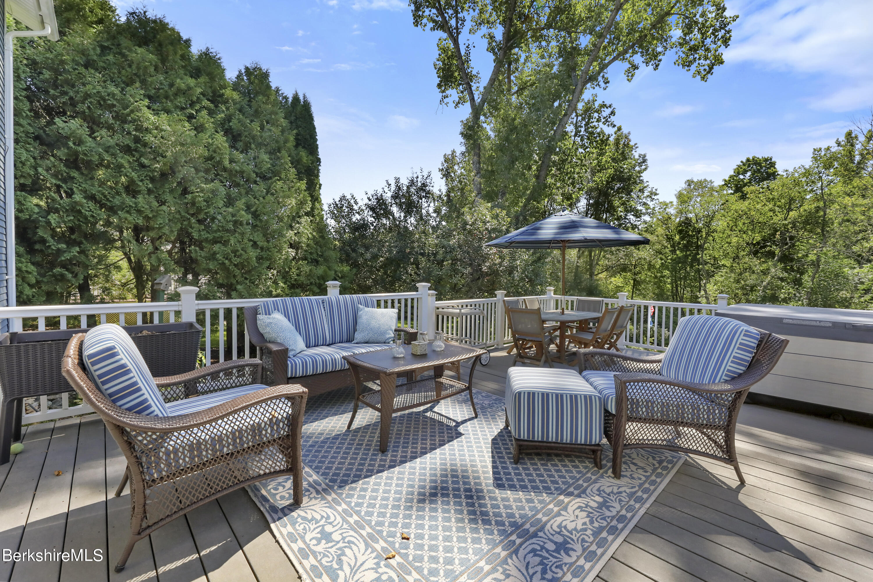 84 Brookside Drive Pittsfield, MA 01201 - Photo 37 of 54 a patio with patio a couch and chairs