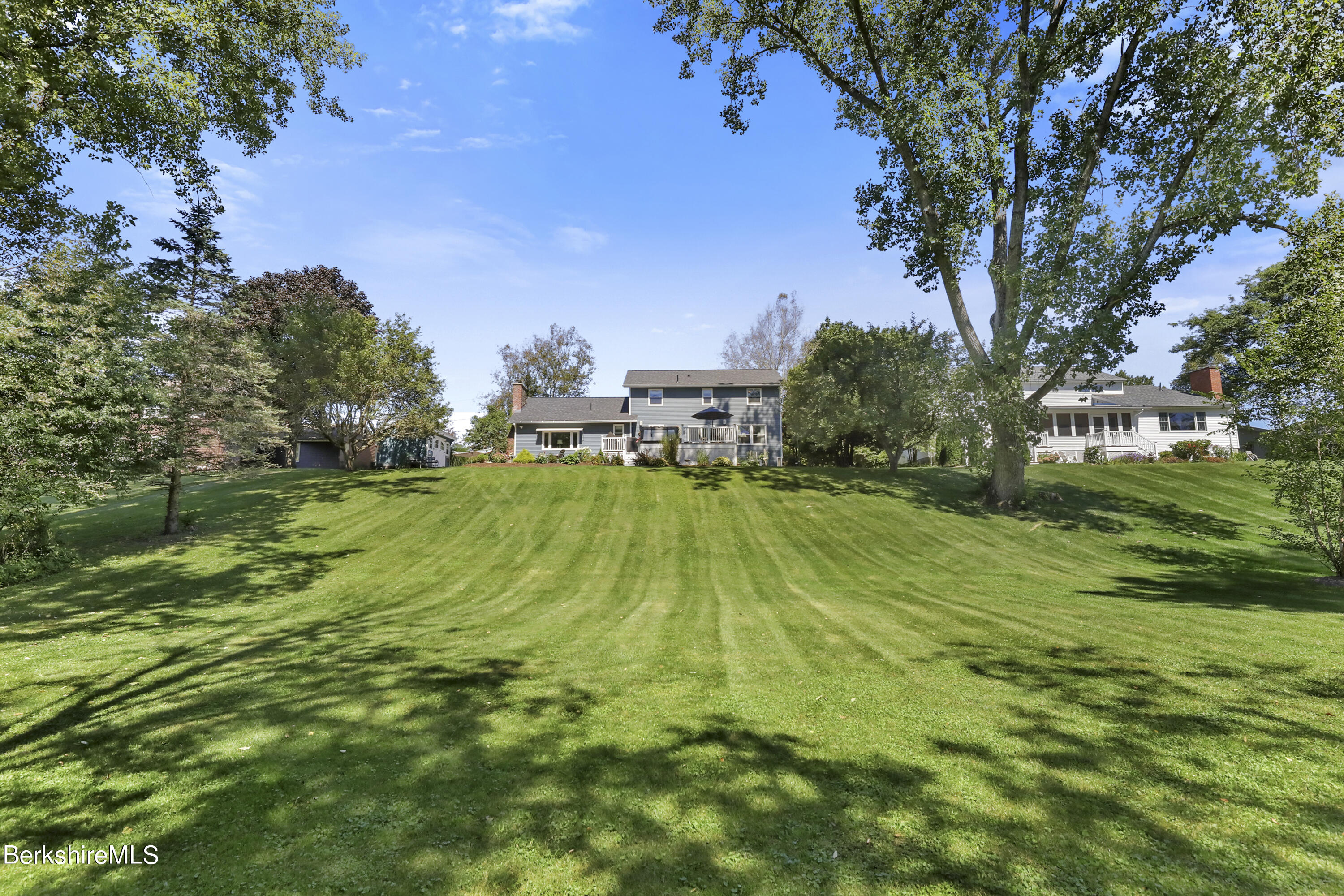 84 Brookside Drive Pittsfield, MA 01201 - Photo 47 of 54 a view of yard with swimming pool and green space