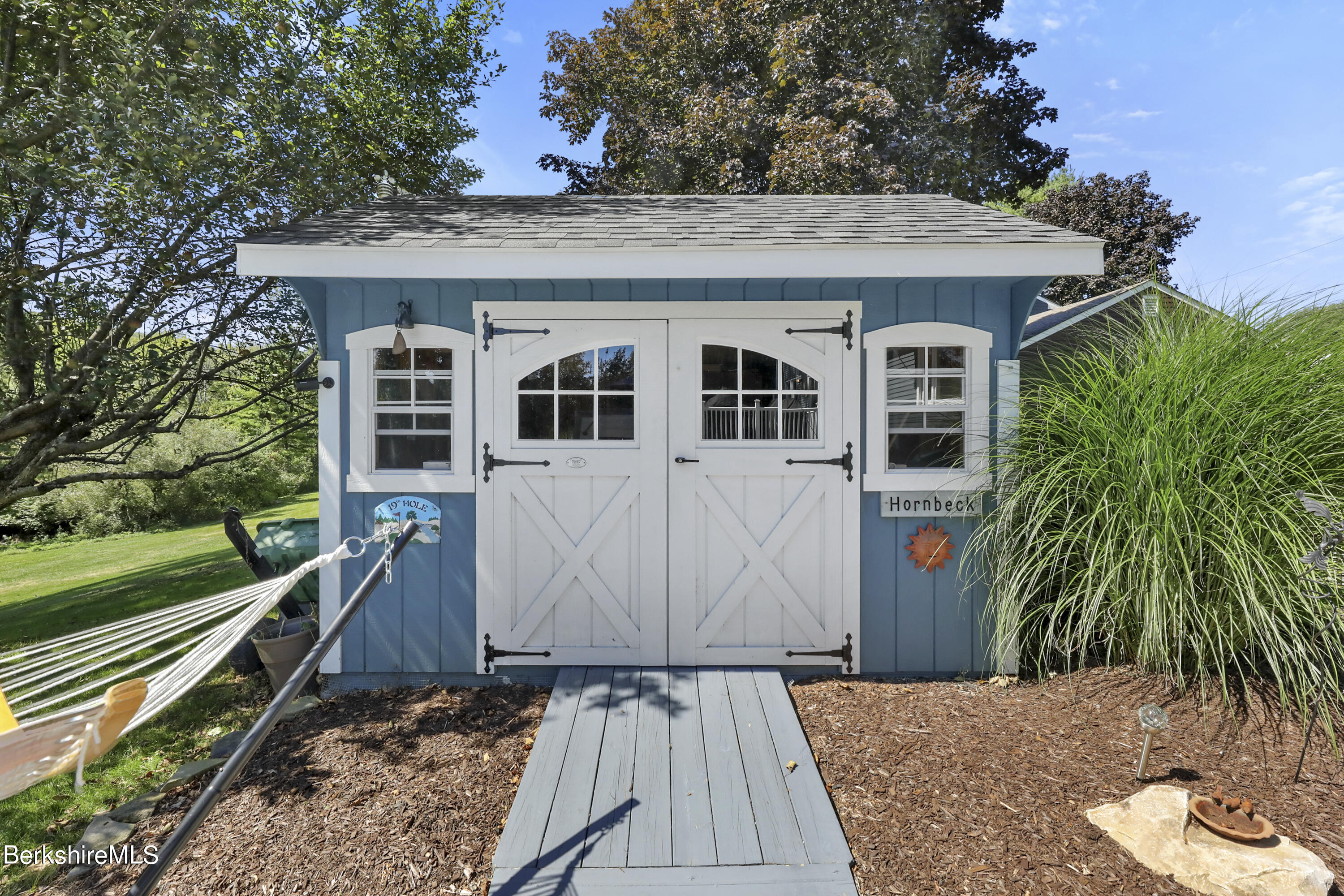 84 Brookside Drive Pittsfield, MA 01201 - Photo 49 of 54 a view of a house with a yard