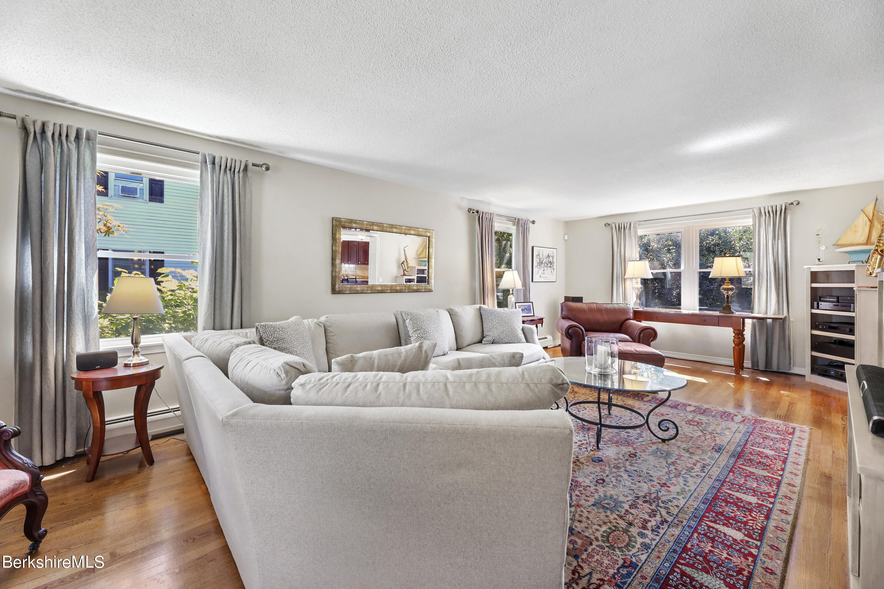 84 Brookside Drive Pittsfield, MA 01201 - Photo 5 of 54 a living room with furniture wooden floor and a window