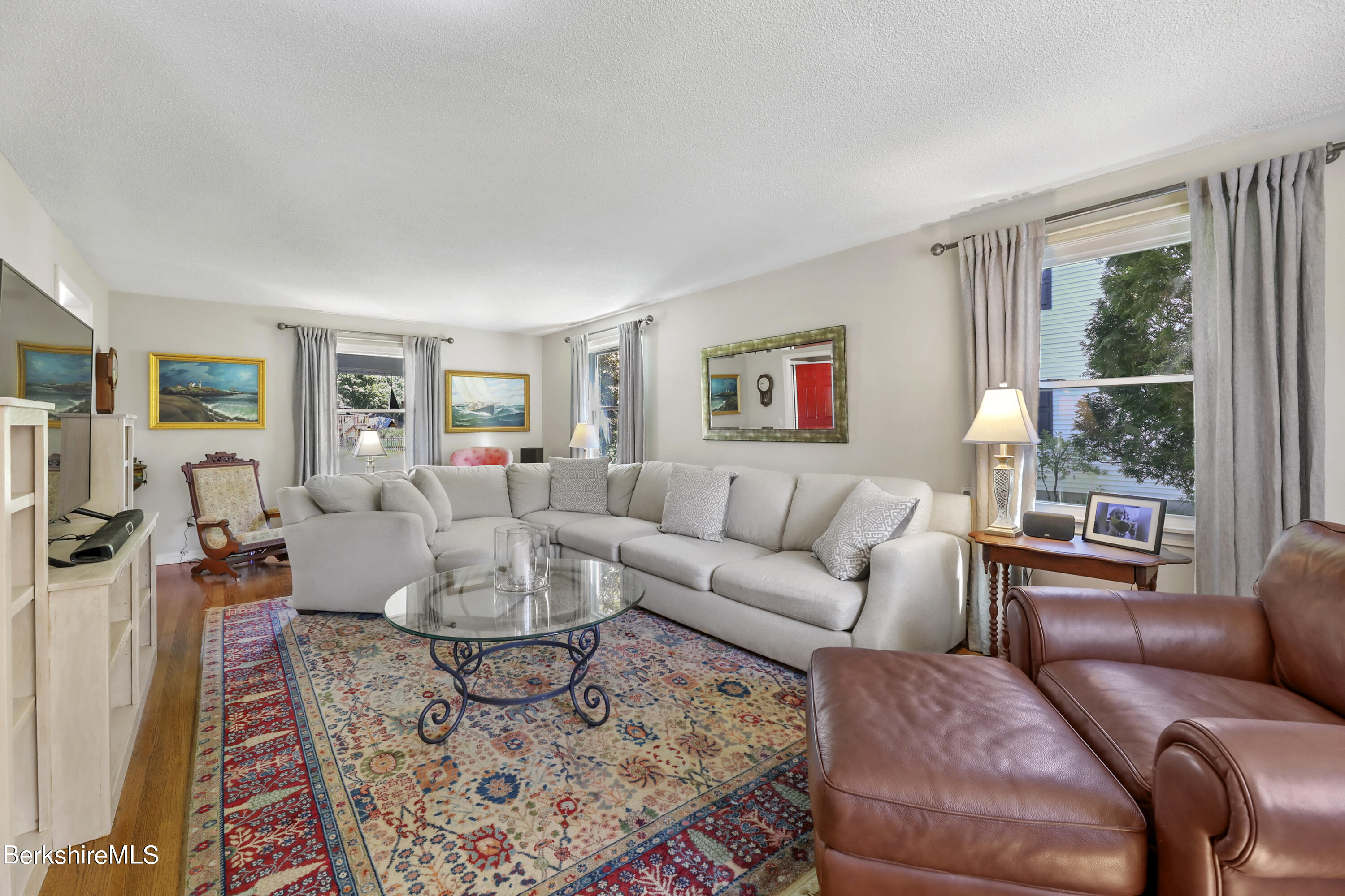 84 Brookside Drive Pittsfield, MA 01201 - Photo 7 of 54 a living room with furniture and a large window