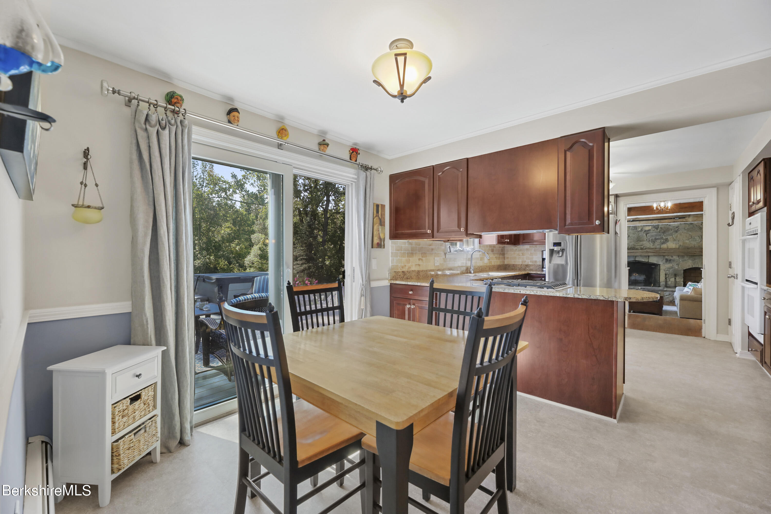 84 Brookside Drive Pittsfield, MA 01201 - Photo 8 of 54 a view of a dining room with furniture window and outside view