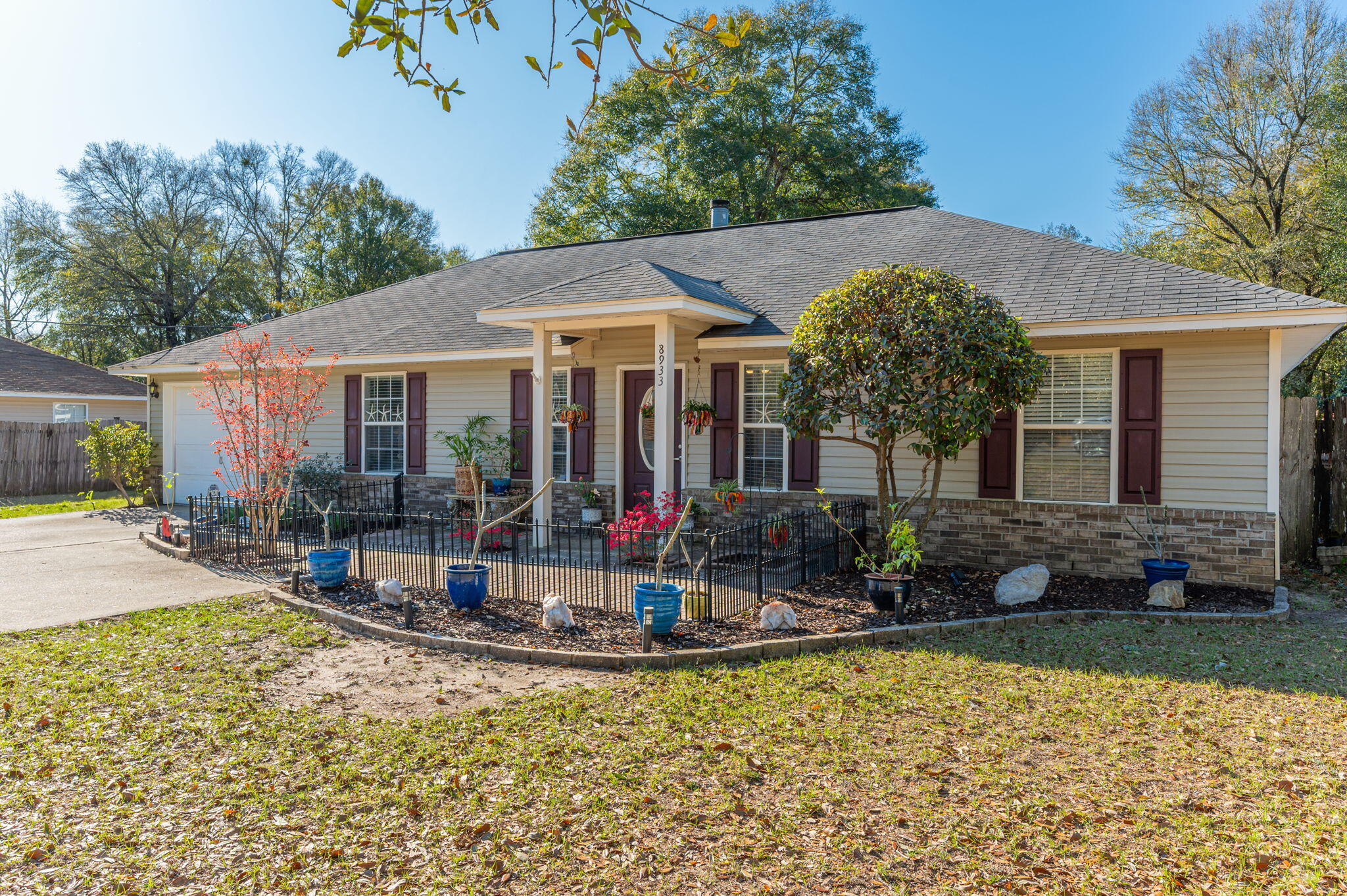 8933 Highway 90 Milton, FL 32583 - Photo 22 of 31 a view of a house with backyard porch and sitting area