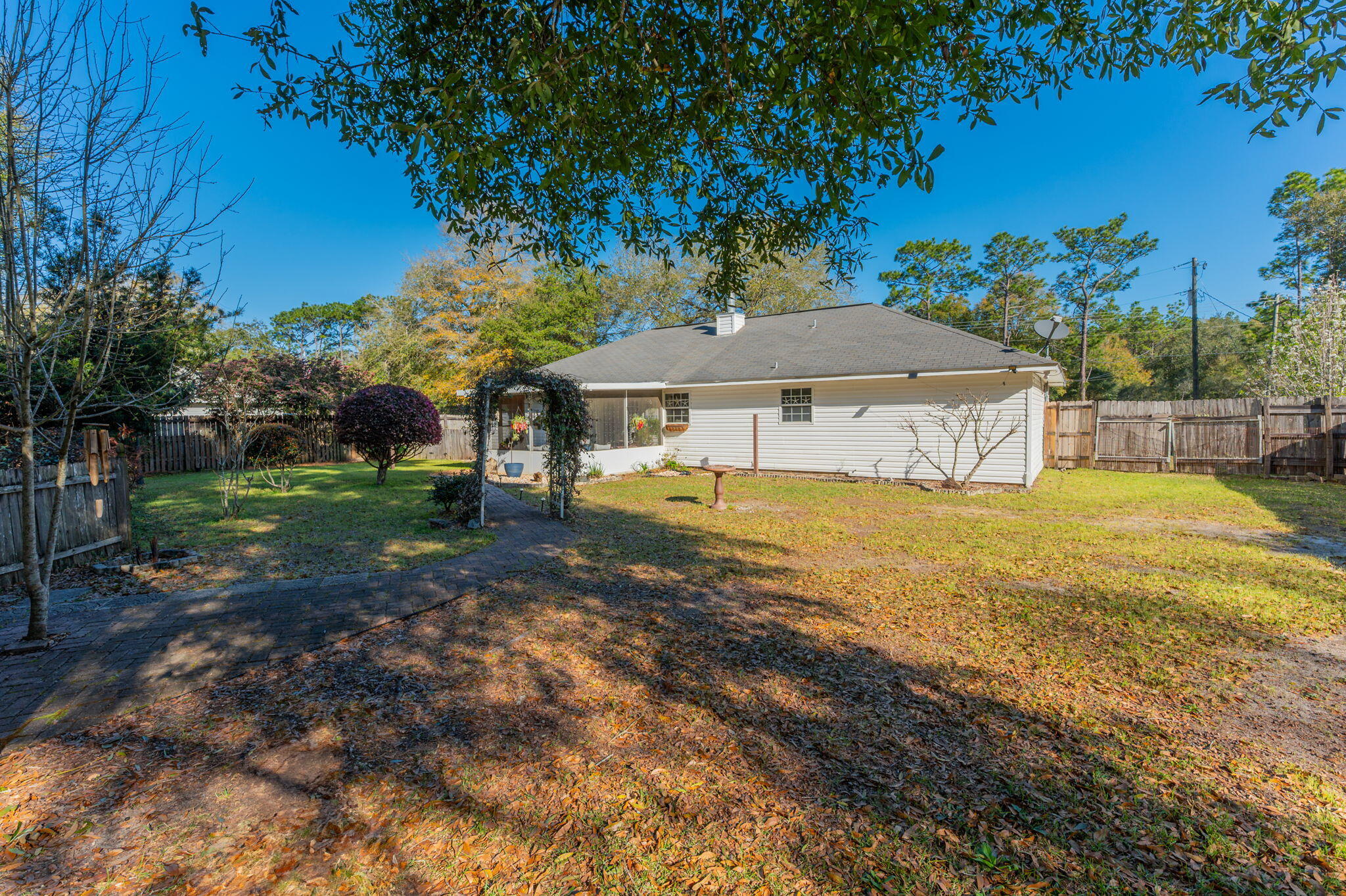 8933 Highway 90 Milton, FL 32583 - Photo 7 of 31 a view of a house with a yard