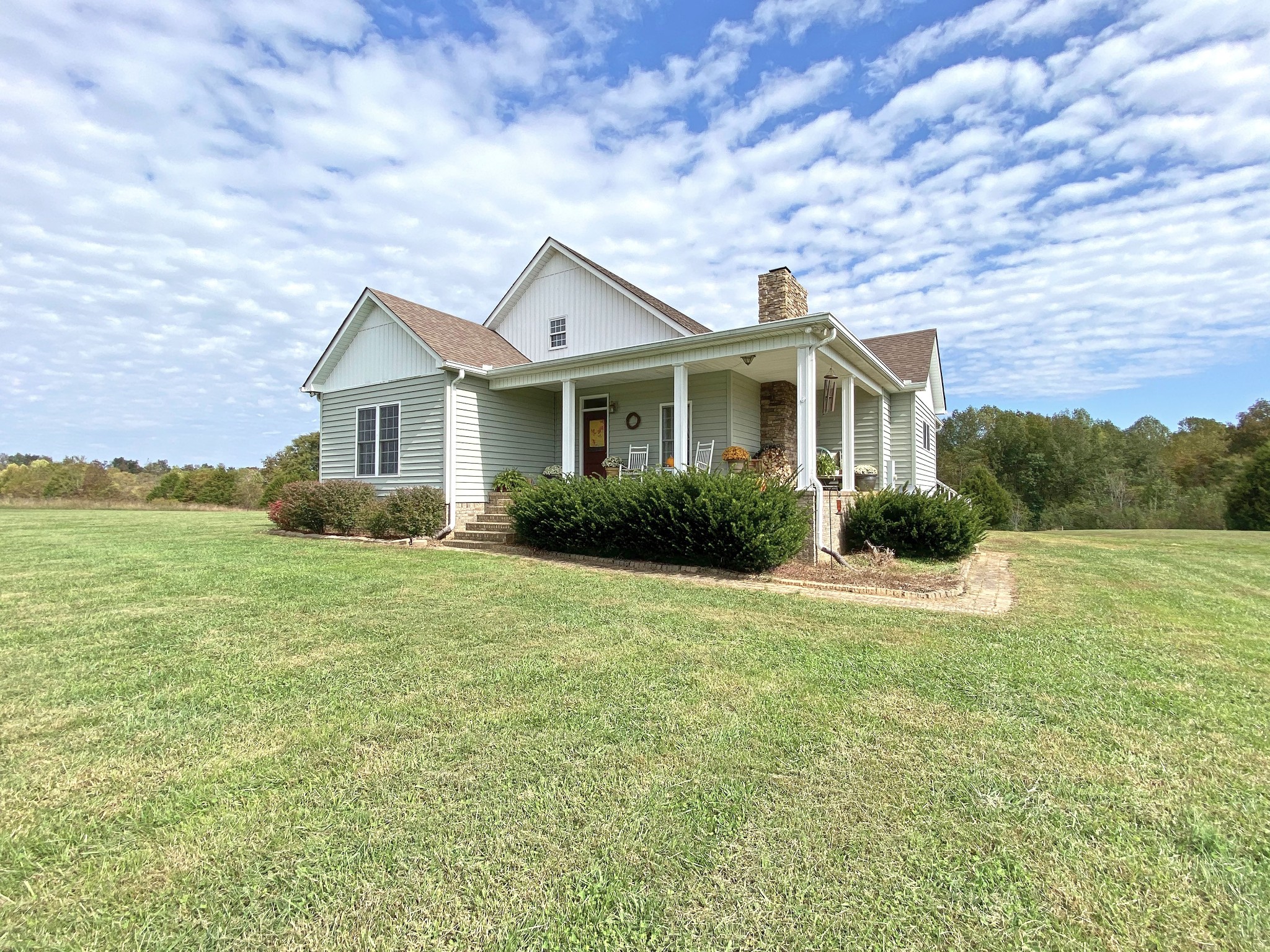 585 Blooming Grove Road Pulaski, TN 38478 - Photo 2 of 41 a front view of a house with a yard