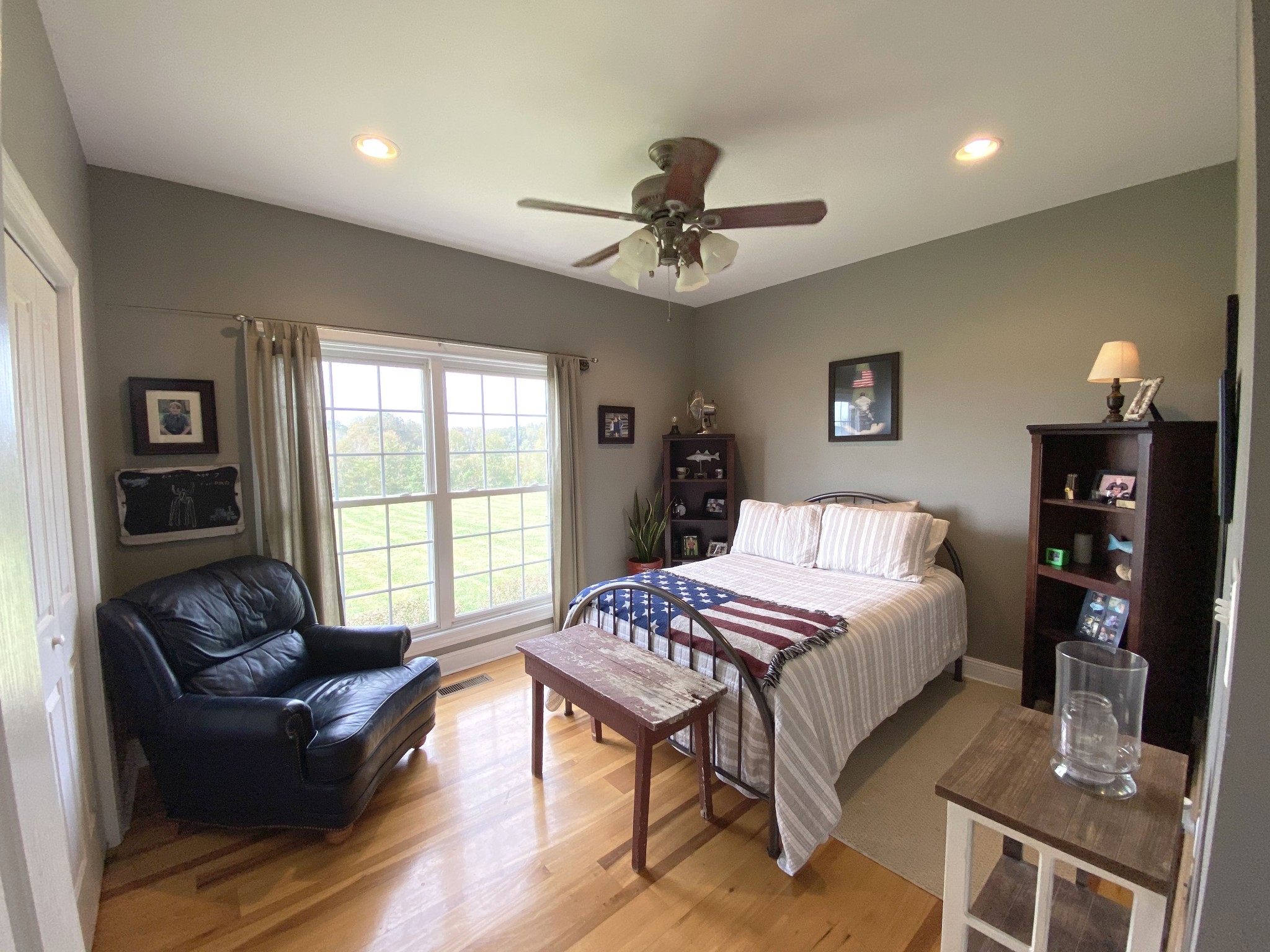 585 Blooming Grove Road Pulaski, TN 38478 - Photo 12 of 41 a bedroom with a bed window and a couch