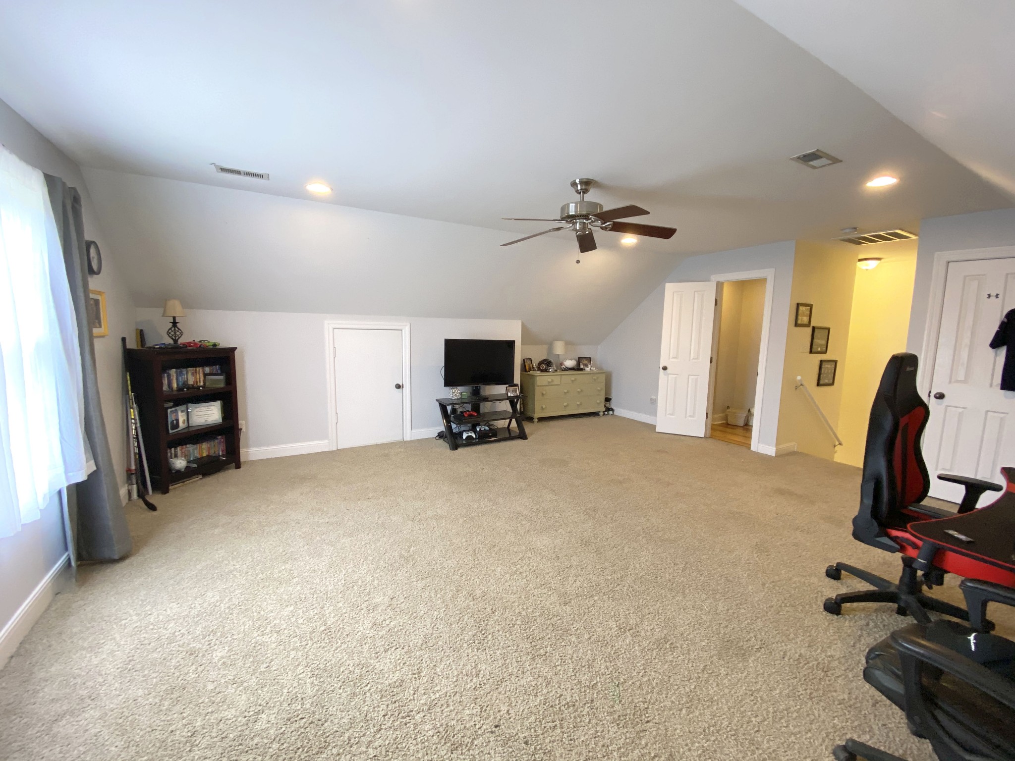 585 Blooming Grove Road Pulaski, TN 38478 - Photo 17 of 41 a view of a livingroom with furniture and a gym cycle