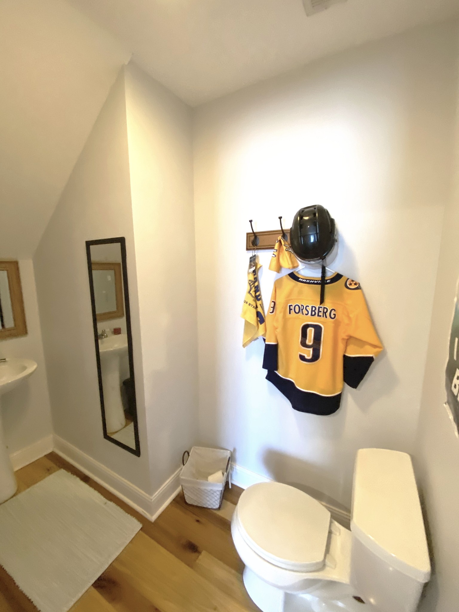 585 Blooming Grove Road Pulaski, TN 38478 - Photo 18 of 41 a bathroom with a toilet and a mirror