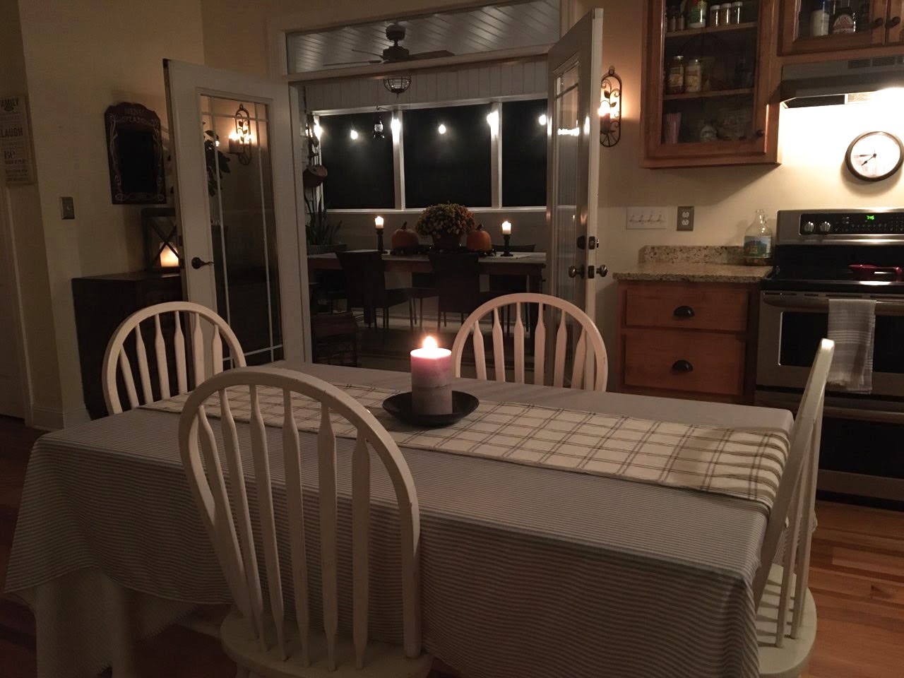 585 Blooming Grove Road Pulaski, TN 38478 - Photo 21 of 41 a kitchen with a sink a table and chairs