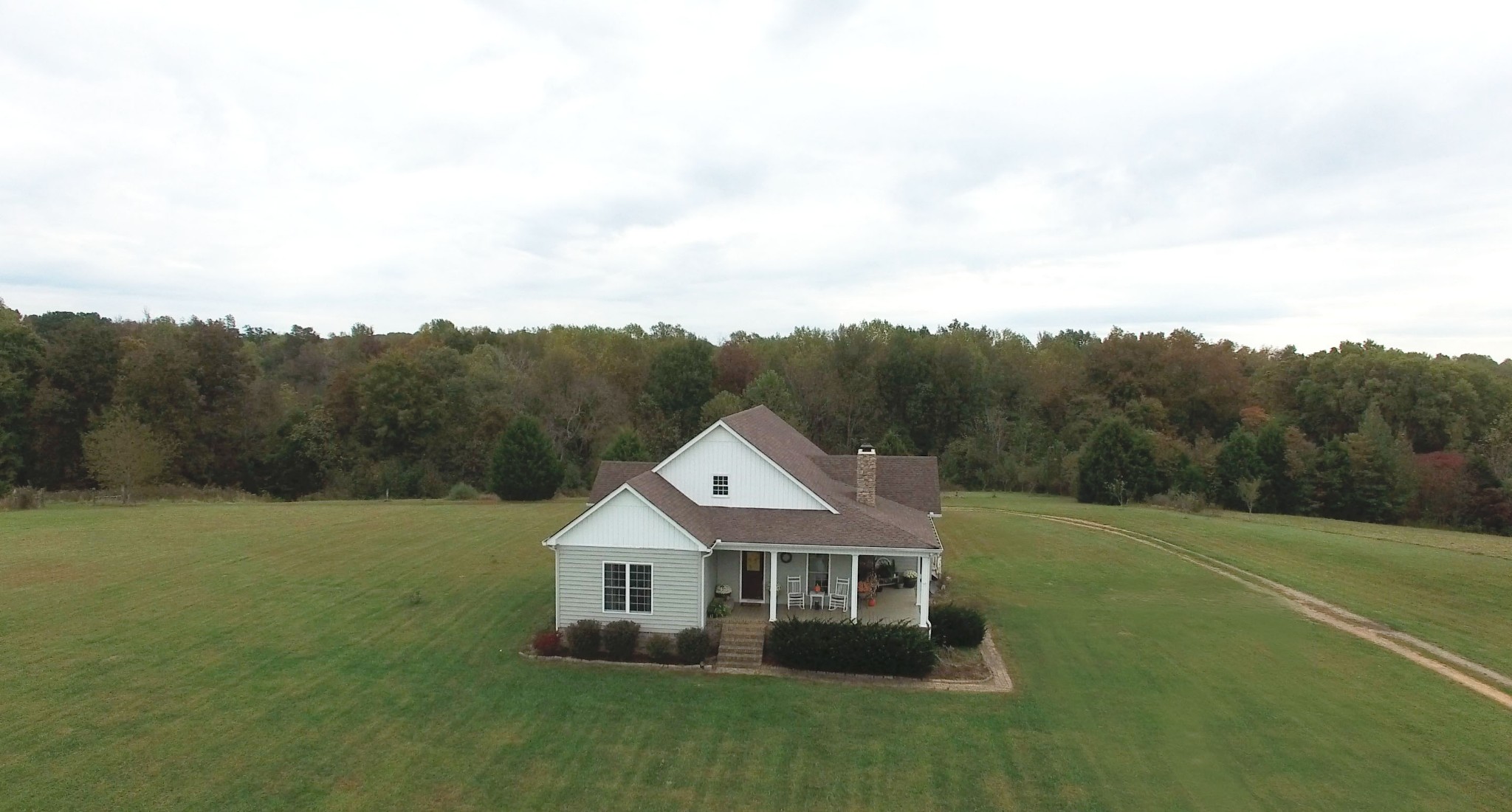 585 Blooming Grove Road Pulaski, TN 38478 - Photo 38 of 41 a aerial view of a house with table and chairs