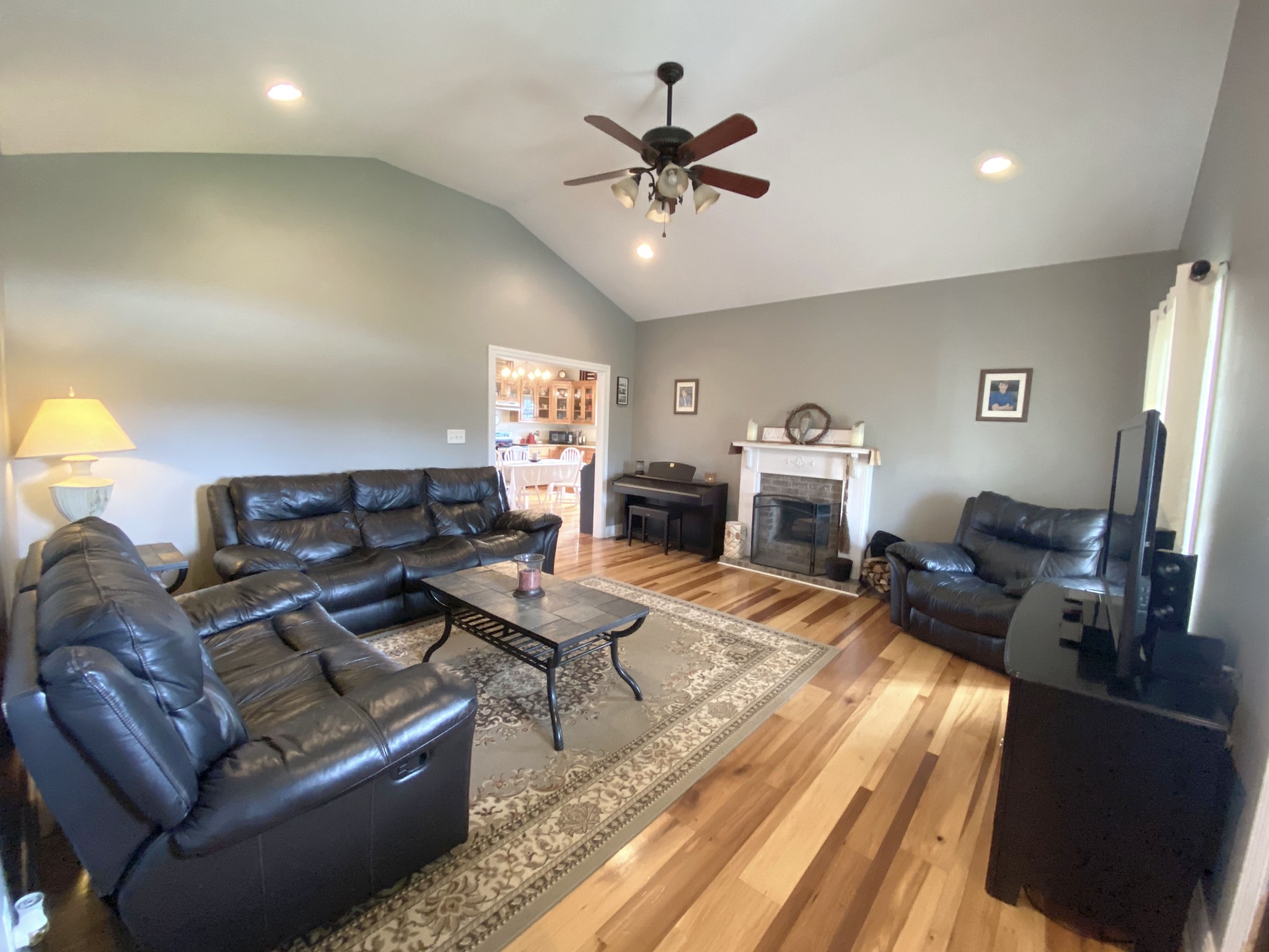 585 Blooming Grove Road Pulaski, TN 38478 - Photo 5 of 41 a living room with furniture and a chandelier