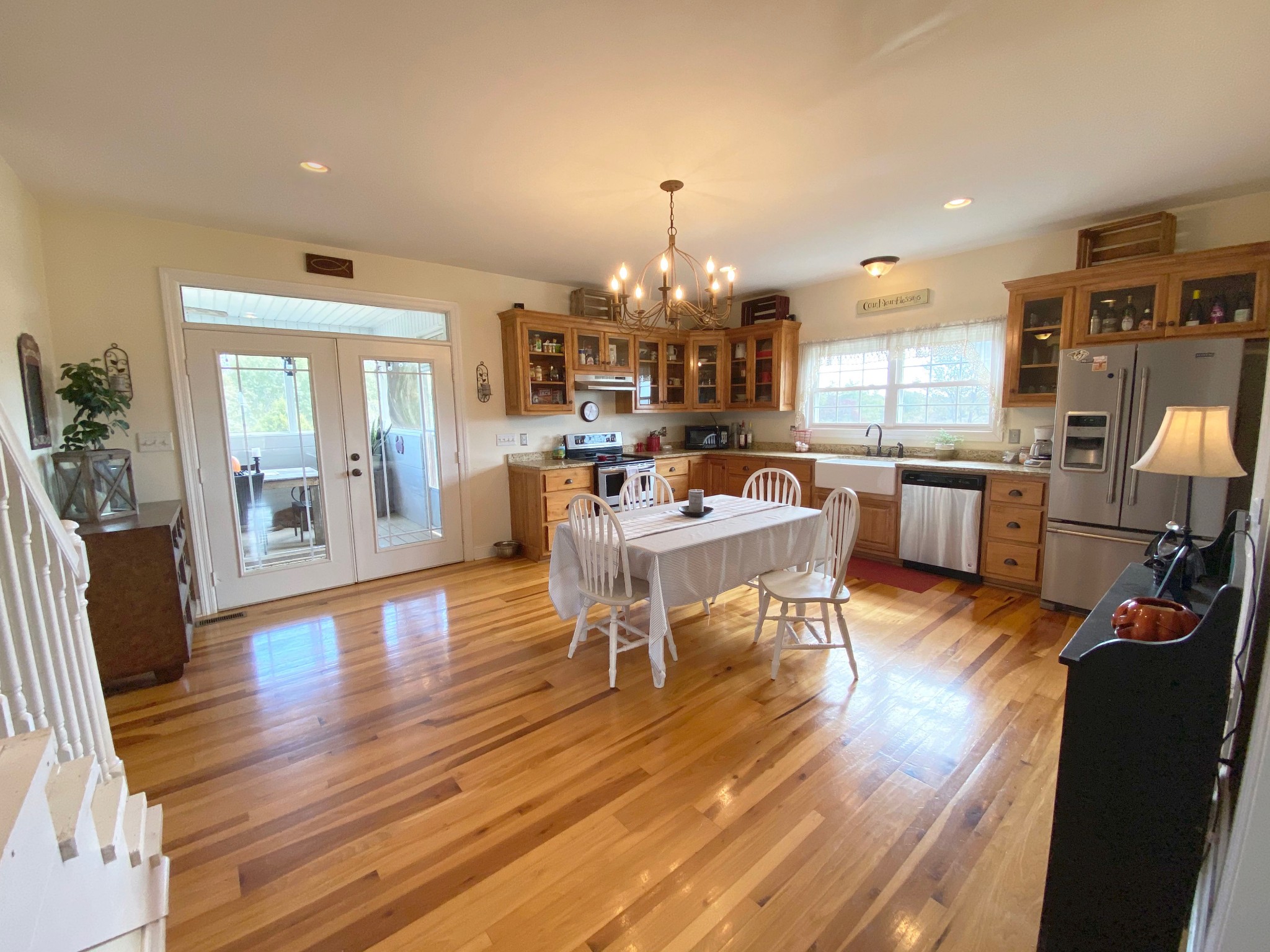 585 Blooming Grove Road Pulaski, TN 38478 - Photo 6 of 41 a living room with fireplace furniture and a wooden floor