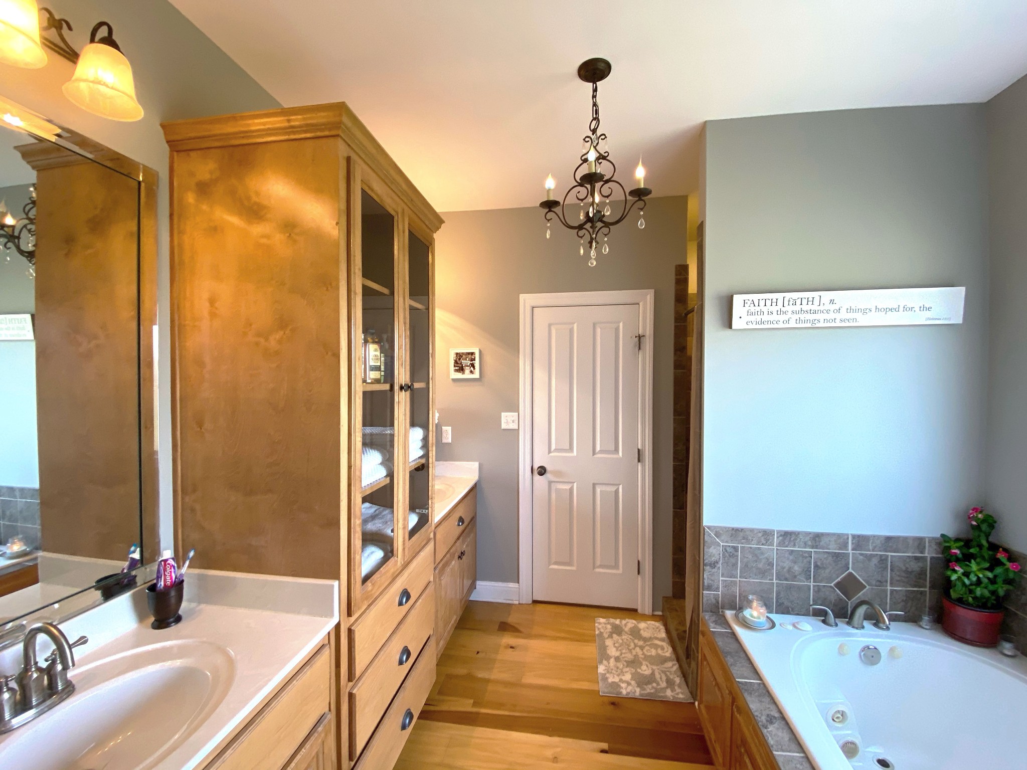 585 Blooming Grove Road Pulaski, TN 38478 - Photo 10 of 41 a spacious bathroom with a tub shower and a sink