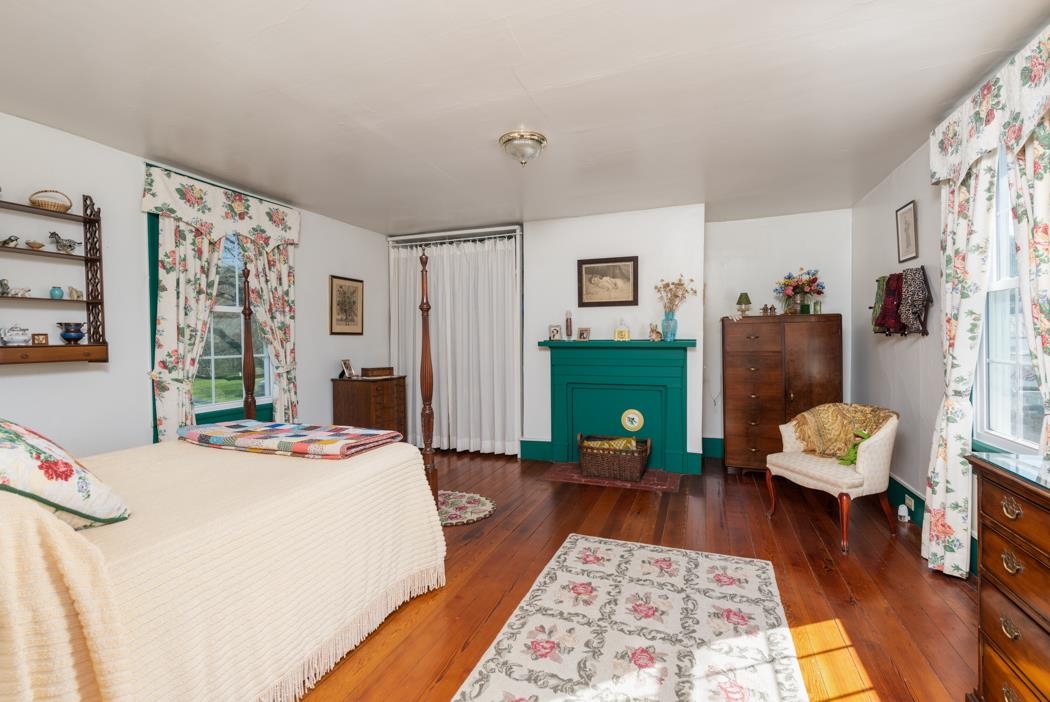 3643 Middlebrook Road Middlebrook, VA 24459 - Photo 25 of 35 a bed room with a bed and a chair