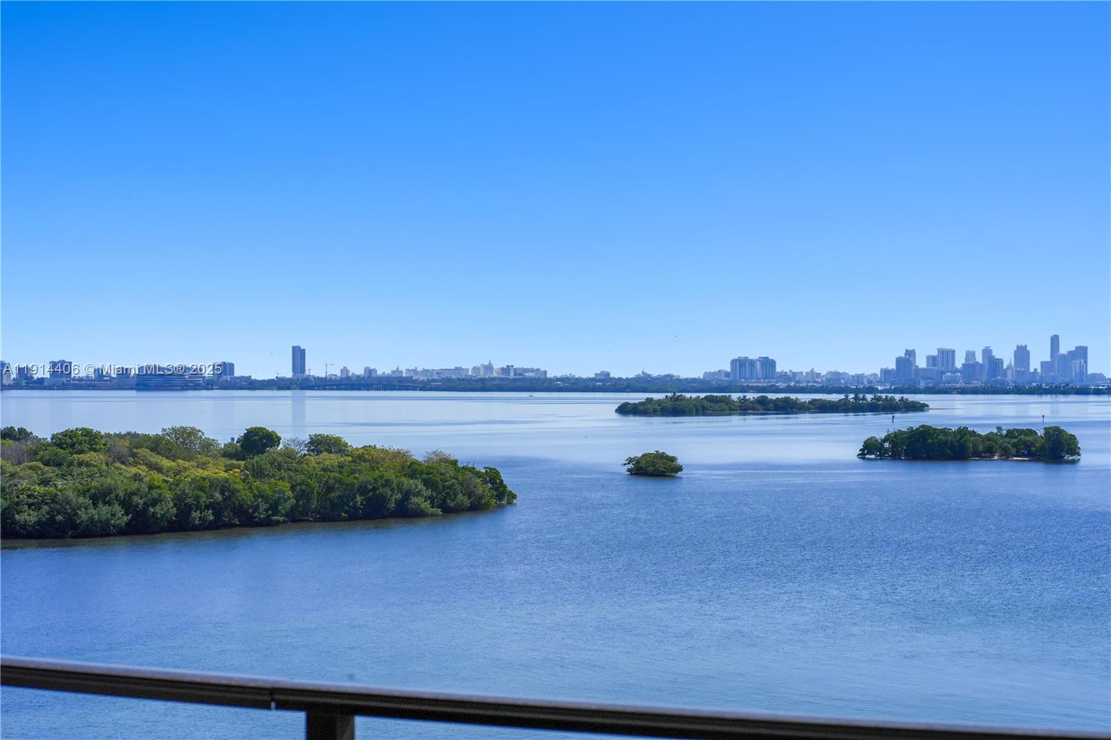 720 Northeast 69th Street, Unit 9W Miami, FL 33138 - Photo 22 of 27 a view of lake with boats and trees in the background