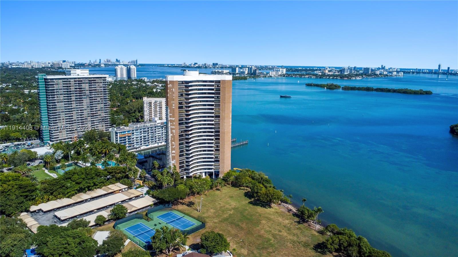 720 Northeast 69th Street, Unit 9W Miami, FL 33138 - Photo 3 of 27 a view of a lake with a city