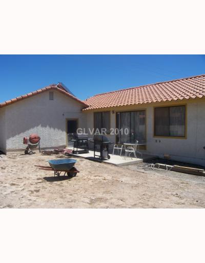 104 South Roland Wiley Road Las Vegas, NV 89145 - Photo 10 of 11 Exterior Back.