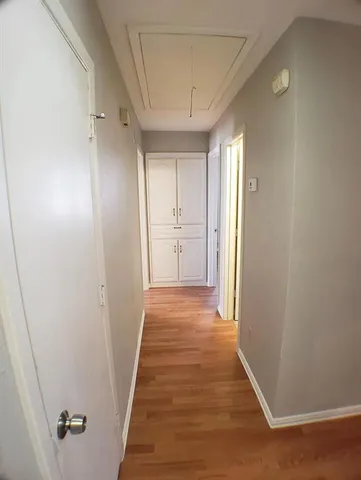 a bathroom with a toilet and a bathtub