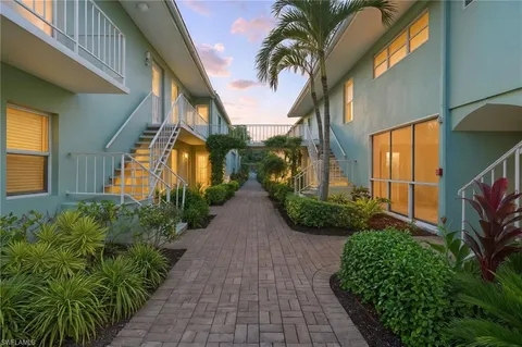 a view of a house with a garden