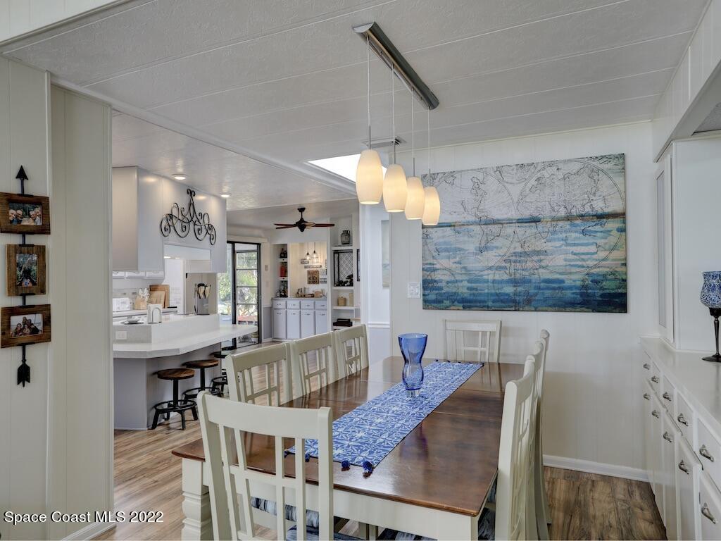 727 Periwinkle Drive Sebastian, FL 32976 - Photo 17 of 34 a view of a dining room with furniture