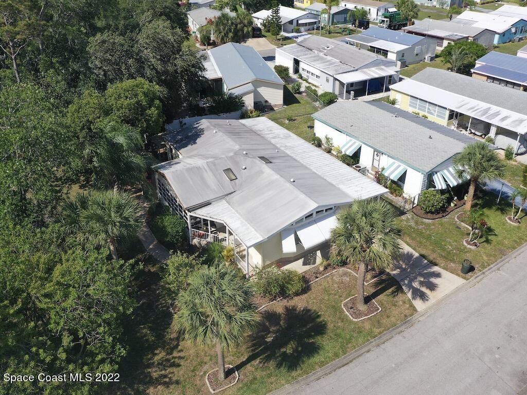 727 Periwinkle Drive Sebastian, FL 32976 - Photo 2 of 34 an aerial view of a residential houses with outdoor space
