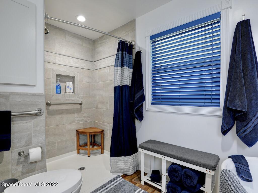 727 Periwinkle Drive Sebastian, FL 32976 - Photo 23 of 34 a bathroom with a sink and a mirror
