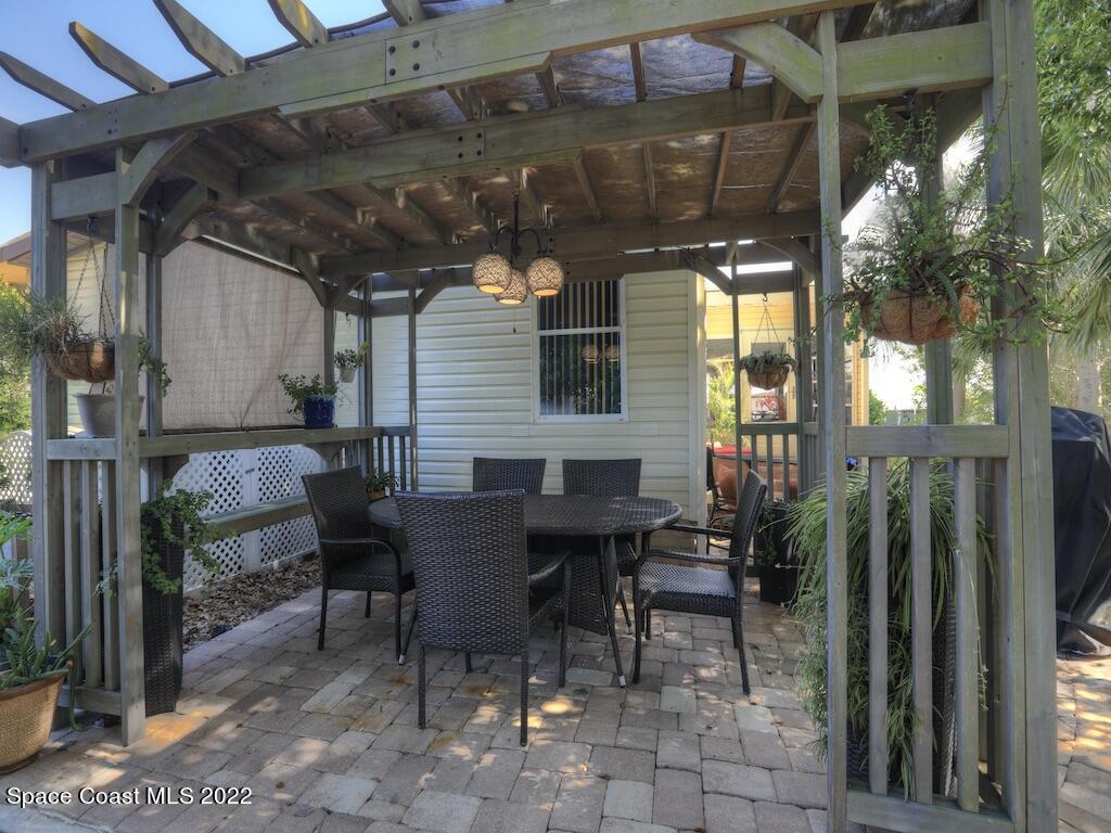 727 Periwinkle Drive Sebastian, FL 32976 - Photo 7 of 34 a view of an outdoor space with a patio